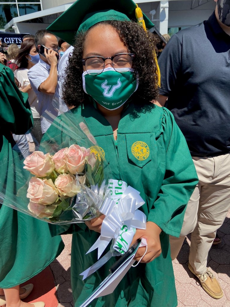 My 1st graduation in 2020 from USF with my B.S. in Health Sciences